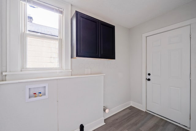 1430 Aberdeen Ave, Columbus, OH 43211 - laundry area with cabinet space, washer hookup, dark wood-style floors, and plenty of natural light