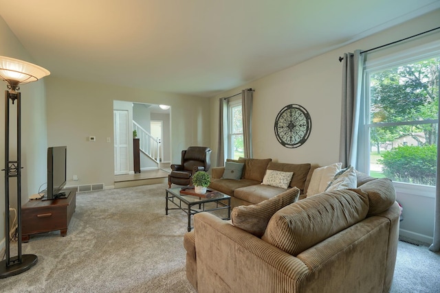 6676 Woodsedge Dr, Reynoldsburg, OH 43068 - living area with light carpet and stairway
