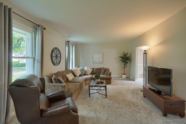 6676 Woodsedge Dr, Reynoldsburg, OH 43068 - living area featuring healthy amount of natural light and carpet floors