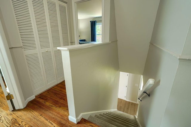 6676 Woodsedge Dr, Reynoldsburg, OH 43068 - stairs with wood finished floors and baseboards