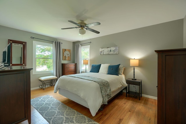 6676 Woodsedge Dr, Reynoldsburg, OH 43068 - bedroom featuring light wood-style floors and ceiling fan