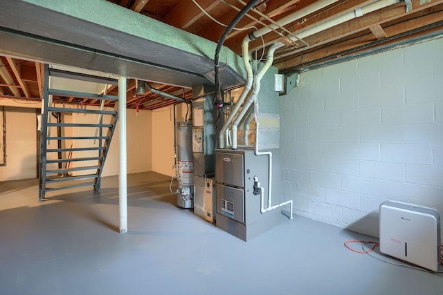 6676 Woodsedge Dr, Reynoldsburg, OH 43068 - unfinished below grade area featuring gas water heater and heating unit