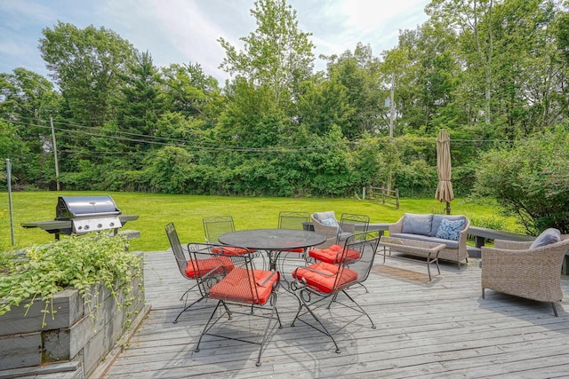 6676 Woodsedge Dr, Reynoldsburg, OH 43068 - wooden deck featuring outdoor dining area, a lawn, an outdoor hangout area, and grilling area