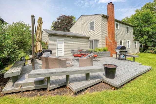 6676 Woodsedge Dr, Reynoldsburg, OH 43068 - rear view of property with outdoor lounge area, a deck, a lawn, and a chimney