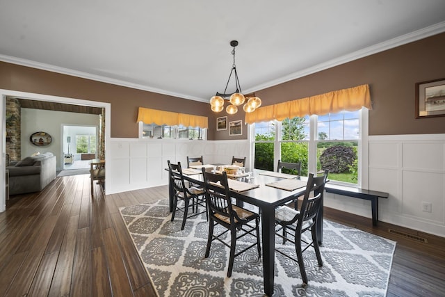 124 Dutch Ridge Way, Johnstown, OH 43031 - dining room with a decorative wall, ornamental molding, wood finished floors, wainscoting, and a chandelier