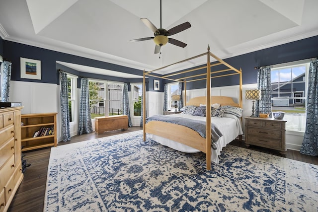 124 Dutch Ridge Way, Johnstown, OH 43031 - bedroom with wood finished floors, a wainscoted wall, a decorative wall, ornamental molding, and a raised ceiling