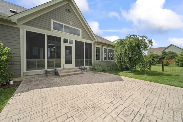 124 Dutch Ridge Way, Johnstown, OH 43031 - rear view of house featuring entry steps, a patio, a sunroom, and roof with shingles