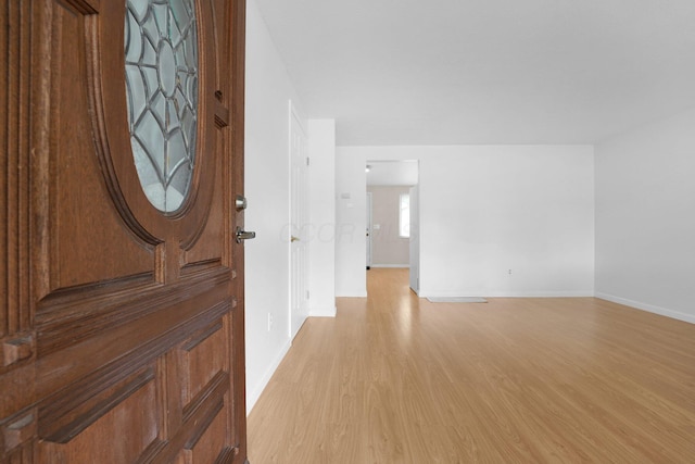 2047 Brookfield Rd, Columbus, OH 43229 - foyer with light wood-style floors and baseboards