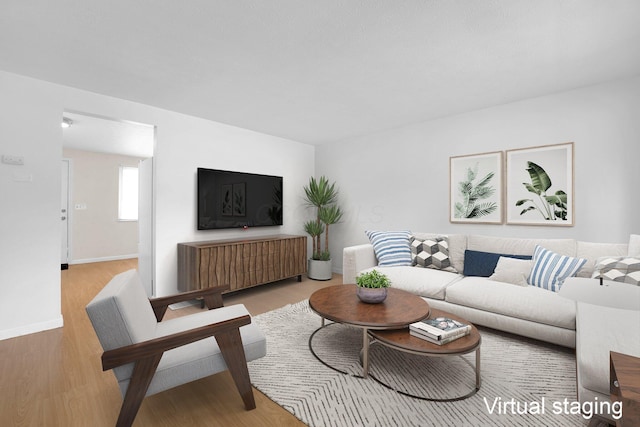 2047 Brookfield Rd, Columbus, OH 43229 - living room featuring wood finished floors and baseboards