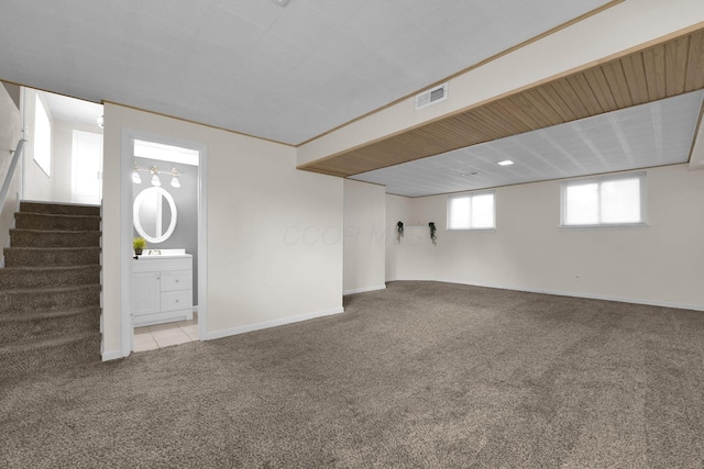 2047 Brookfield Rd, Columbus, OH 43229 - basement with carpet and stairs