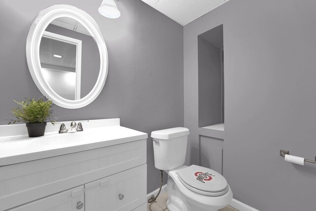 2047 Brookfield Rd, Columbus, OH 43229 - half bathroom featuring vanity and tile patterned floors
