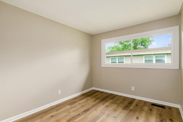 99 Ramona Ave, Newark, OH 43055 - spare room with baseboards and light wood finished floors