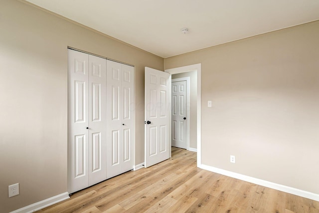 99 Ramona Ave, Newark, OH 43055 - unfurnished bedroom featuring light wood finished floors and a closet
