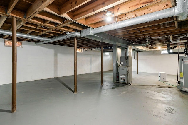 99 Ramona Ave, Newark, OH 43055 - unfinished basement with gas water heater and heating unit