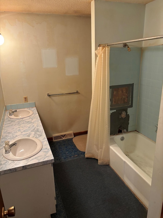 54 Appleview Ct, Howard, OH 43028 - bathroom with shower / bath combo with shower curtain, double vanity, and a textured ceiling