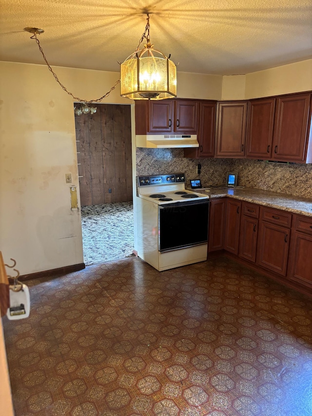 54 Appleview Ct, Howard, OH 43028 - kitchen with white electric range oven, under cabinet range hood, a chandelier, decorative backsplash, and pendant lighting