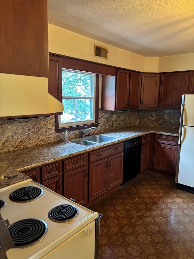 54 Appleview Ct, Howard, OH 43028 - kitchen with white appliances, range hood, decorative backsplash, and a textured ceiling