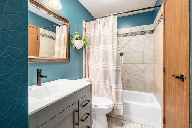 658 Academy Dr, Galloway, OH 43119 - full bath with vanity, shower / bath combo with shower curtain, tile patterned floors, and a textured ceiling