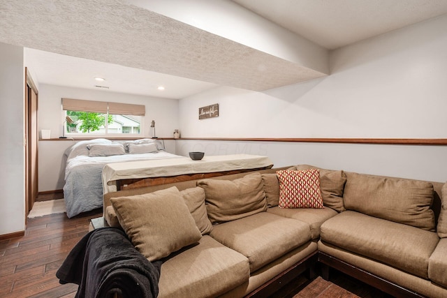 658 Academy Dr, Galloway, OH 43119 - bedroom with dark wood-type flooring, recessed lighting, and a textured ceiling