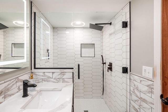 658 Academy Dr, Galloway, OH 43119 - full bathroom featuring a shower stall, tile walls, and vanity