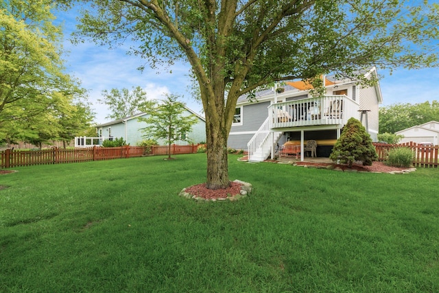 658 Academy Dr, Galloway, OH 43119 - fenced backyard featuring stairs and a wooden deck