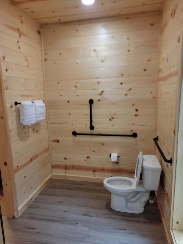 18358 Buckingham Rd, Logan, OH 43138 - bathroom featuring wood walls and wood finished floors
