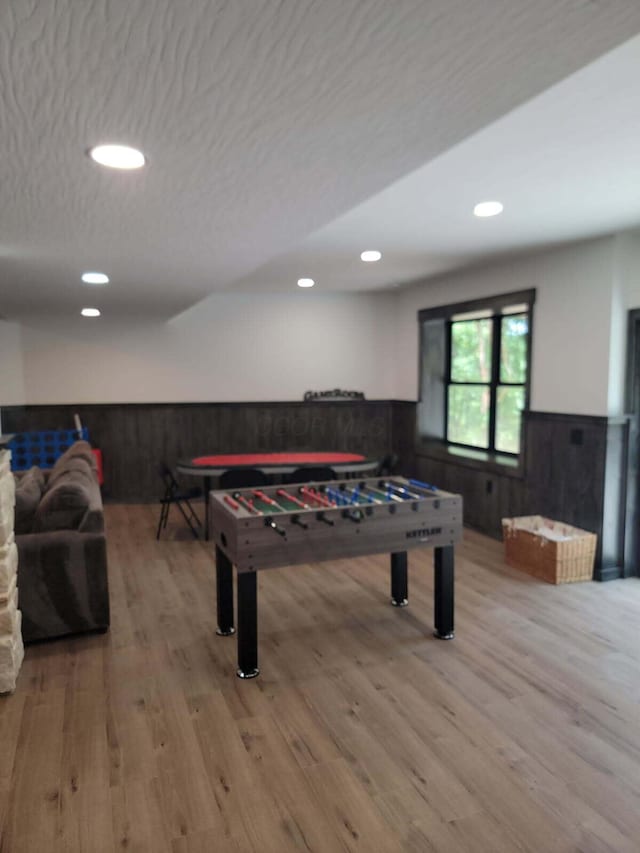 18358 Buckingham Rd, Logan, OH 43138 - playroom with a wainscoted wall, wood finished floors, and recessed lighting