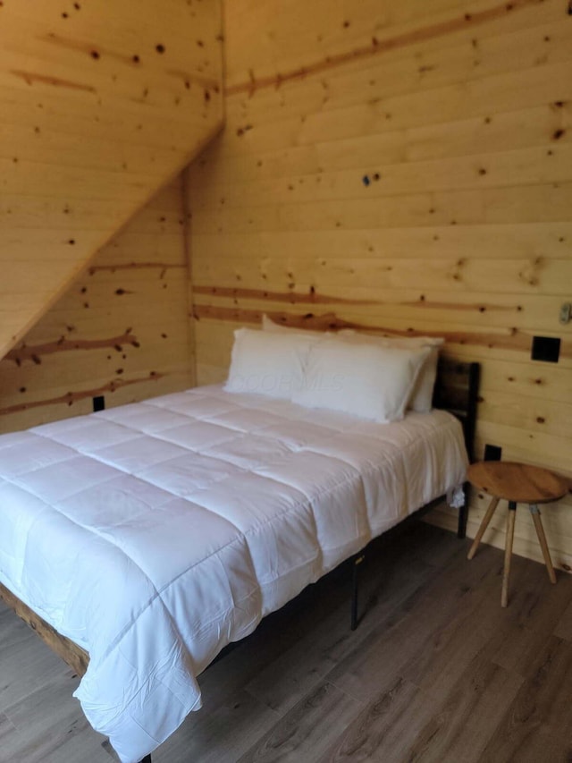 18358 Buckingham Rd, Logan, OH 43138 - bedroom featuring wooden walls and wood finished floors