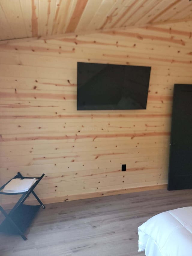 18358 Buckingham Rd, Logan, OH 43138 - bedroom with wooden walls, wooden ceiling, wood finished floors, and lofted ceiling