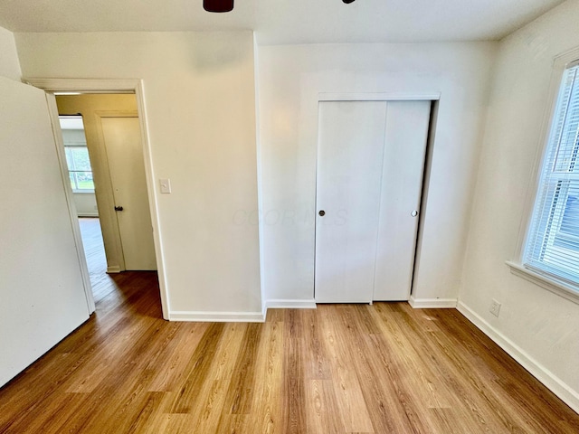 139 S Ashburton Rd, Columbus, OH 43213 - unfurnished bedroom featuring light wood-style floors and a closet