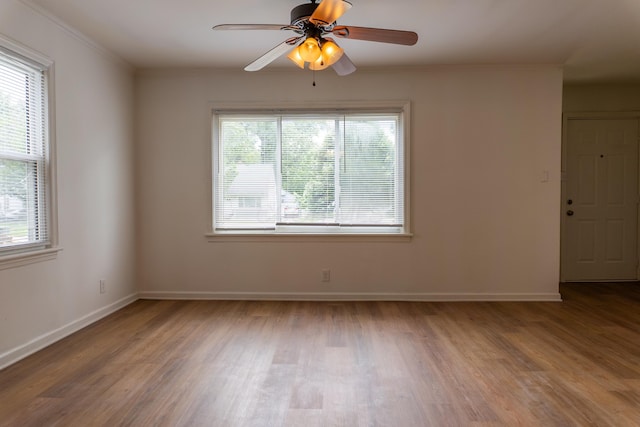 139 S Ashburton Rd, Columbus, OH 43213 - empty room with wood finished floors, a ceiling fan, and ornamental molding