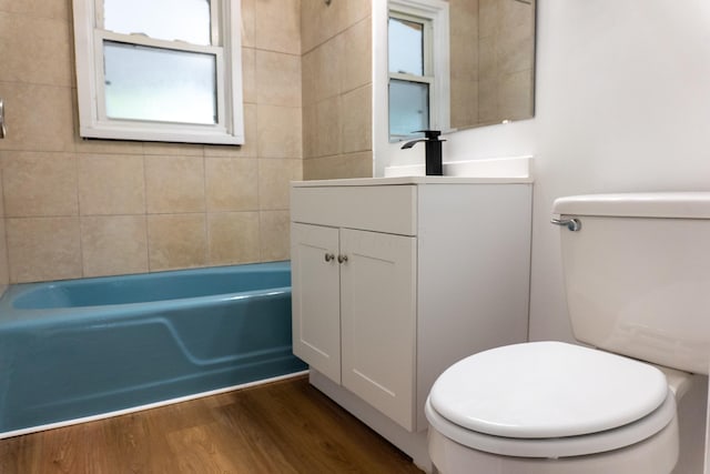 139 S Ashburton Rd, Columbus, OH 43213 - full bathroom featuring vanity, tub / shower combination, and wood finished floors