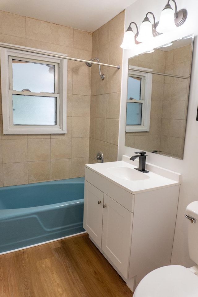 139 S Ashburton Rd, Columbus, OH 43213 - bathroom with vanity, bathtub / shower combination, and wood finished floors