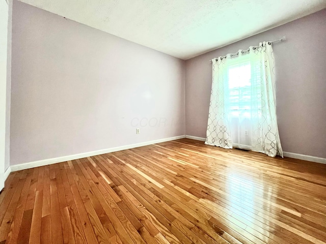 5200 Williamsburg Cir, Hilliard, OH 43026 - unfurnished room with wood-type flooring and baseboards