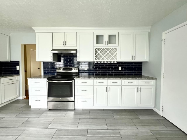 5200 Williamsburg Cir, Hilliard, OH 43026 - kitchen featuring stainless steel electric stove, under cabinet range hood, backsplash, white cabinets, and stone counters