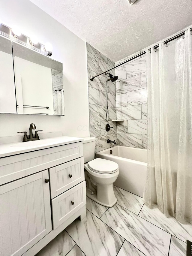 5200 Williamsburg Cir, Hilliard, OH 43026 - full bathroom featuring marble finish flooring, shower / bath combo, vanity, and a textured ceiling