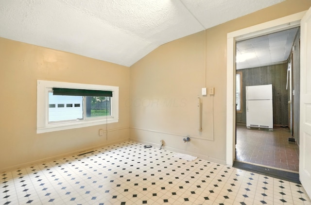 3001/2 Calhoun St, Mount Vernon, OH 43050 - unfurnished room with lofted ceiling and a textured ceiling
