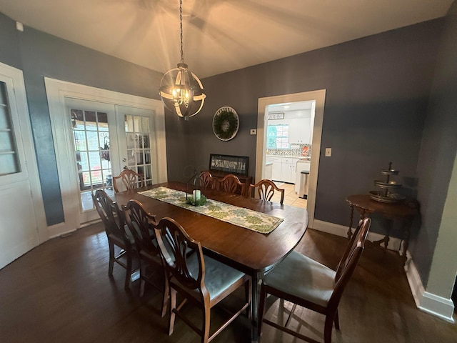 552 E 5th Ave, Lancaster, OH 43130 - dining space with french doors, a chandelier, dark wood-type flooring, and healthy amount of natural light