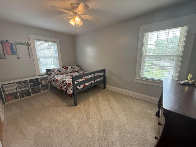 552 E 5th Ave, Lancaster, OH 43130 - bedroom with multiple windows, carpet floors, and a ceiling fan