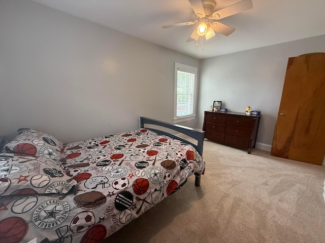552 E 5th Ave, Lancaster, OH 43130 - bedroom featuring light colored carpet and a ceiling fan