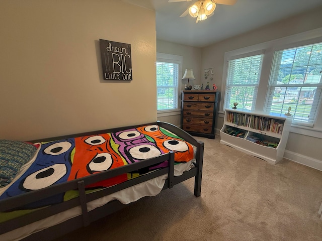 552 E 5th Ave, Lancaster, OH 43130 - carpeted bedroom with ceiling fan and baseboards