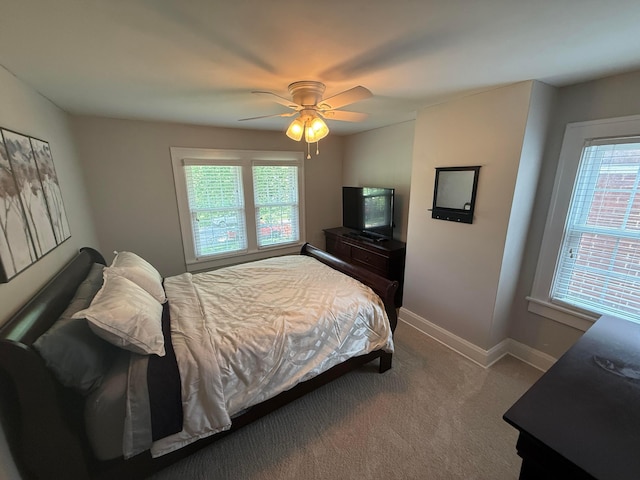 552 E 5th Ave, Lancaster, OH 43130 - carpeted bedroom with baseboards and ceiling fan