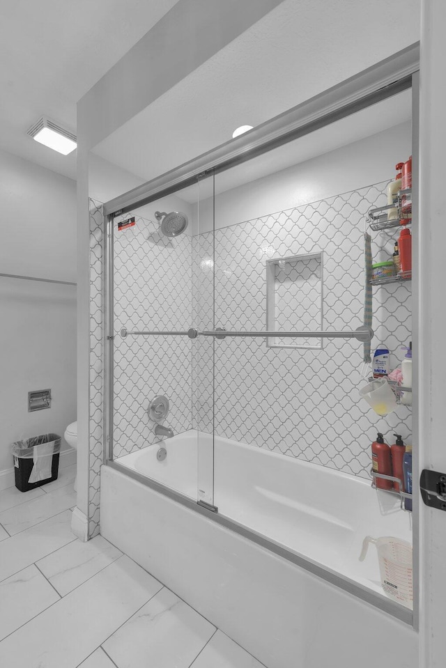 7732 Quarry Cliff Ct, Reynoldsburg, OH 43068 - full bathroom featuring shower / bath combination with glass door and tile patterned floors