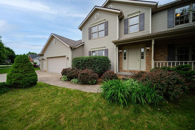 1948 Wendover Cir NE, North Canton, OH 44720 - traditional-style house with a front yard, an attached garage, driveway, brick siding, and a porch