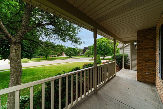 1948 Wendover Cir NE, North Canton, OH 44720 - wooden porch with a lawn