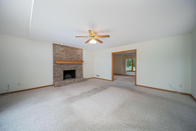 1948 Wendover Cir NE, North Canton, OH 44720 - unfurnished living room with a ceiling fan, light carpet, and a fireplace