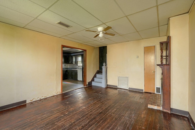 514 S Columbus St, Lancaster, OH 43130 - unfurnished room with a drop ceiling, ceiling fan, wood-type flooring, and stairs
