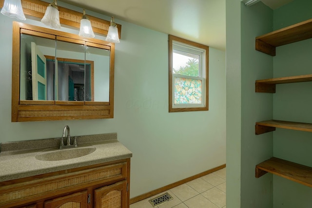 514 S Columbus St, Lancaster, OH 43130 - bathroom with vanity and tile patterned floors