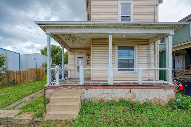 514 S Columbus St, Lancaster, OH 43130 - view of front facade with a porch