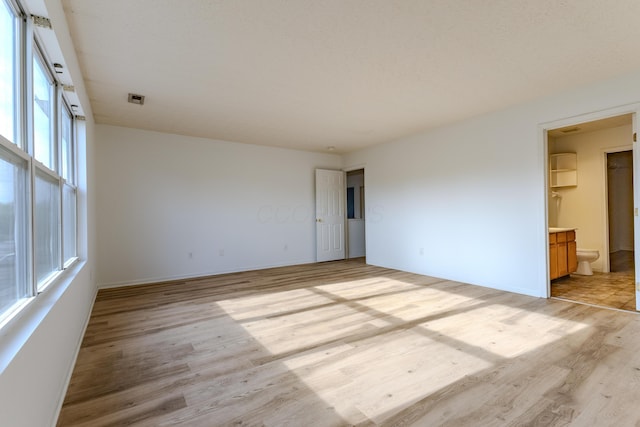 5480 Rothermund Dr, Canal Winchester, OH 43110 - empty room featuring light wood finished floors and plenty of natural light